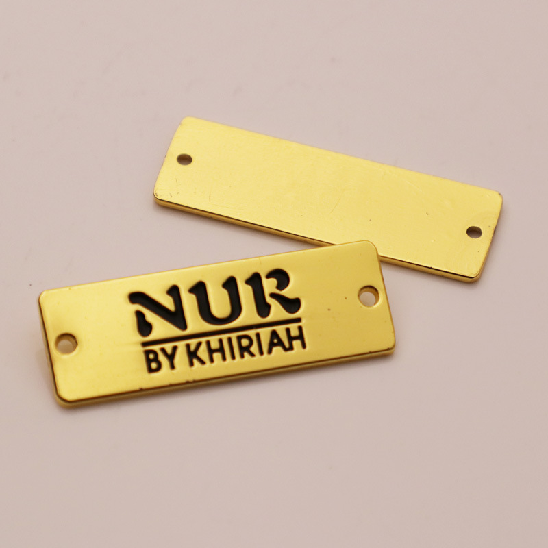custom metal logo tags for clothing supplier